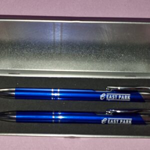 Photograph of a pen and pencil set in a presentation box. The pen and pencil each have the logo of East Park in Glasgow on them.